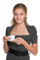 Teen girl with a cup of coffee