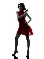 sexy woman holding gun  silhouette