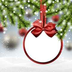 Paper bauble on spruce branches.