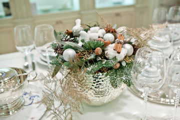 Christmas decoration interior using twigs, needles, cones, cinna