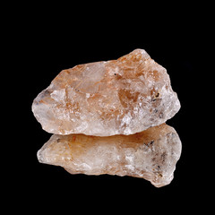 Rutile  quartz on black background ,reflection