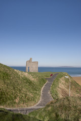 Fototapeta na wymiar path and benches to Ballybunion castle and beach