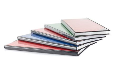 Heap of accounting notebook on white