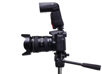  DSLR camera on tripod with external flash