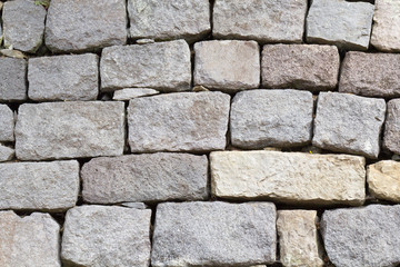 mur de pierres sèches taillées