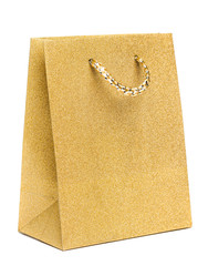 golden gift bag isolated on white background