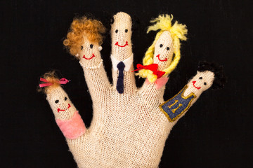 Happy family concept on glove's fingers