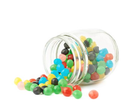 Candy ball sweets falling out of a jar