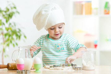 little baker kid girl in chef hat