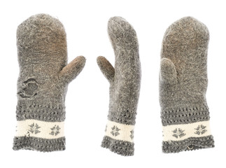 Old gray frayed mitten isolated