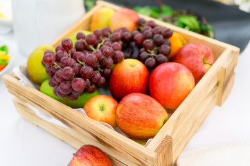 Fruit Basket with Apples and Grapes