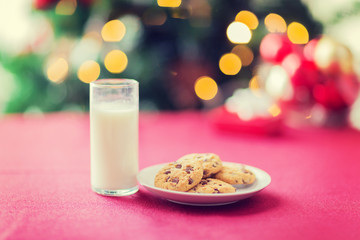 room with christmas tree and decorated table
