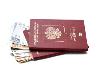 Валюта в российском паспорте на белом фоне.