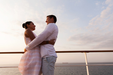 couple hugging each other on a cruise ship