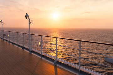 deck of a cruise ship at sunrise