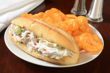 Seafood sandwich and chips