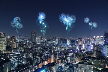 Fireworks celebrating over Tokyo cityscape at night