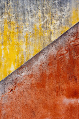 Gelb-rote Hauswand als Textur