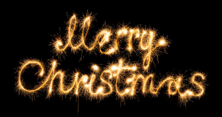 Merry christmas made of sparkles on black