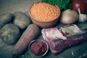 Ingredients for Turkey vegetable soup with red lentils, lying on