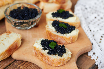 Black caviar on a slice of bread