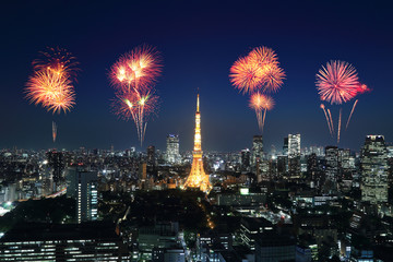 Obraz premium Fireworks celebrating over Tokyo cityscape at night