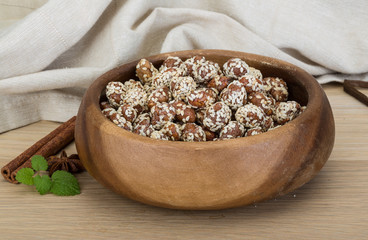 Peanut in honey with sesame seeds