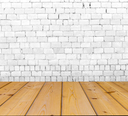 Old brick wall on wood floor