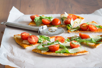 Arugula, Shaved Parmesan and Cherry Tomato Pizza