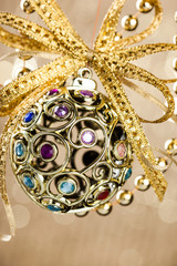 Christmas ball on shiny background