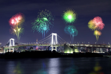 Fireworks celebrating over Tokyo Rainbow Bridge at Night, Japan