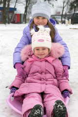 child playing in the winter