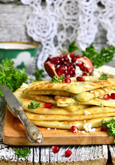 Flat cake with filling from potato,brynza and herbs.