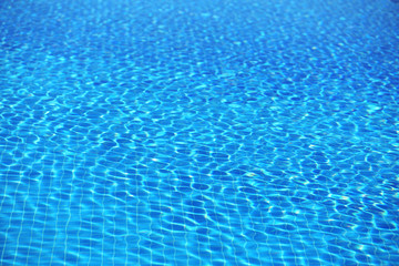 Blue water in swimming pool