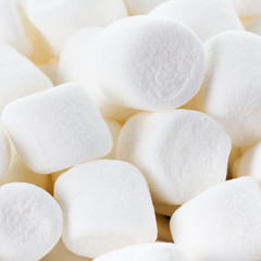 Fototapeta na wymiar White Fluffy Round Marshmallows as a background. Sweet Food Ca