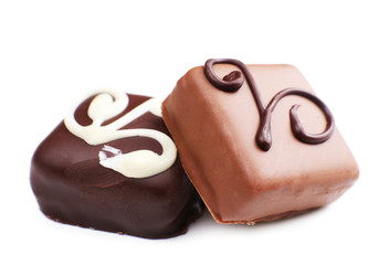 Delicious chocolate candy isolated on white