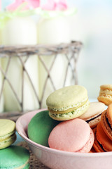 Gentle colorful macaroons and milk bottles