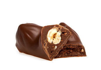 Chocolate bar with nuts on a white background