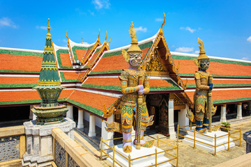 Naklejka premium Giant Buddha in Wat Phra Kaeo, Temple of the Emerald Buddha in B