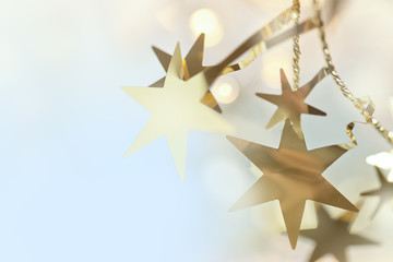 Christmas background with bokeh and garland of stars