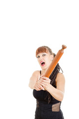 Sexy woman threatening with rolling pin