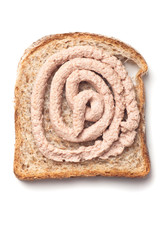 Pâté spread on slice of bread