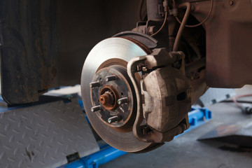 Detail image of car's break assembly after repair
