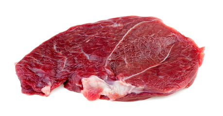 Single red meat lamb steak isolated against white