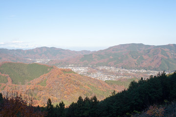 Fototapeta na wymiar Colorful mountains with autumn leaves in Japan