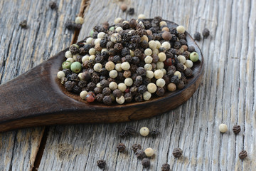 Peppercorn on a wooden Spoon