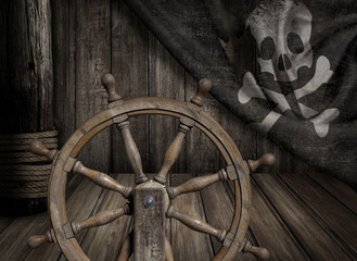 Pirates ship steering wheel with old jolly roger flag