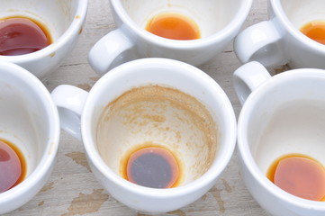 Obraz na płótnie Canvas Dirty cups after coffee on the table