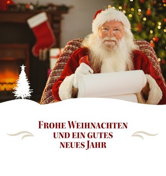 Composite image of happy santa writing list with a quill