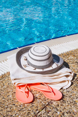 Fototapeta na wymiar Beach accessories at the pool